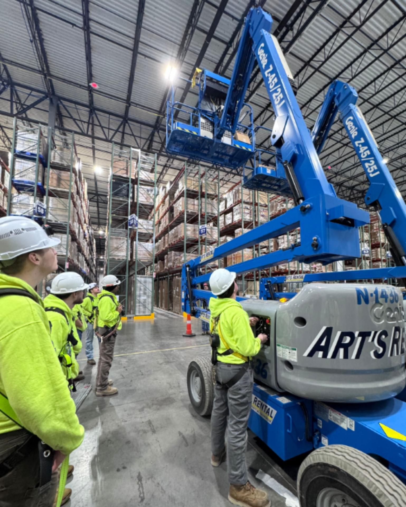 Your Company crew running aerial lift safety on-site